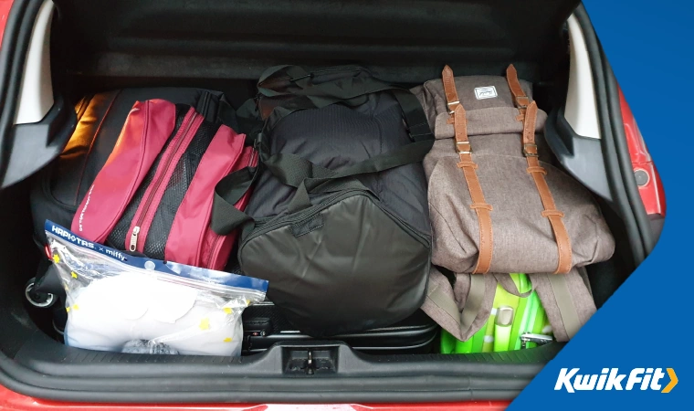 car boot full of packed bags