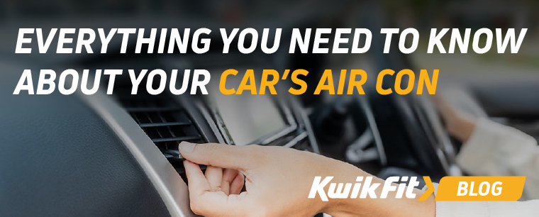 Someone inside a car adjusting an air con fan