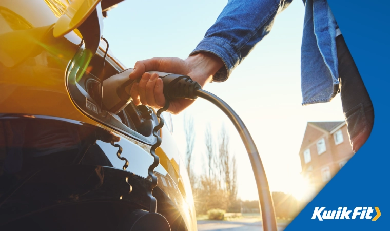 plugging in an electric vehicle