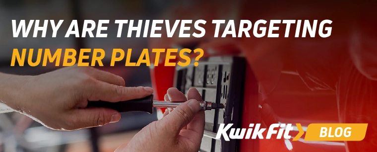 Someone unscrewing a number plate